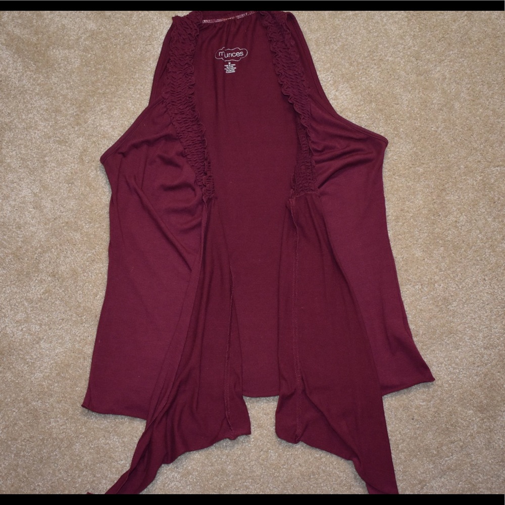 Maurice’s maroon sleeveless cardigan